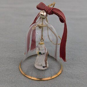 Glass gold-rimmed Christmas bell ornament with Father Christmas
